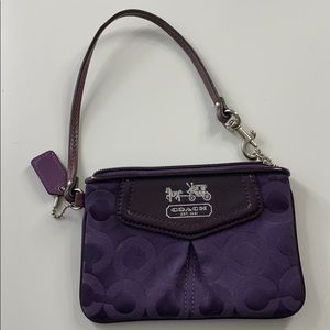 Purple signature coach wristlet